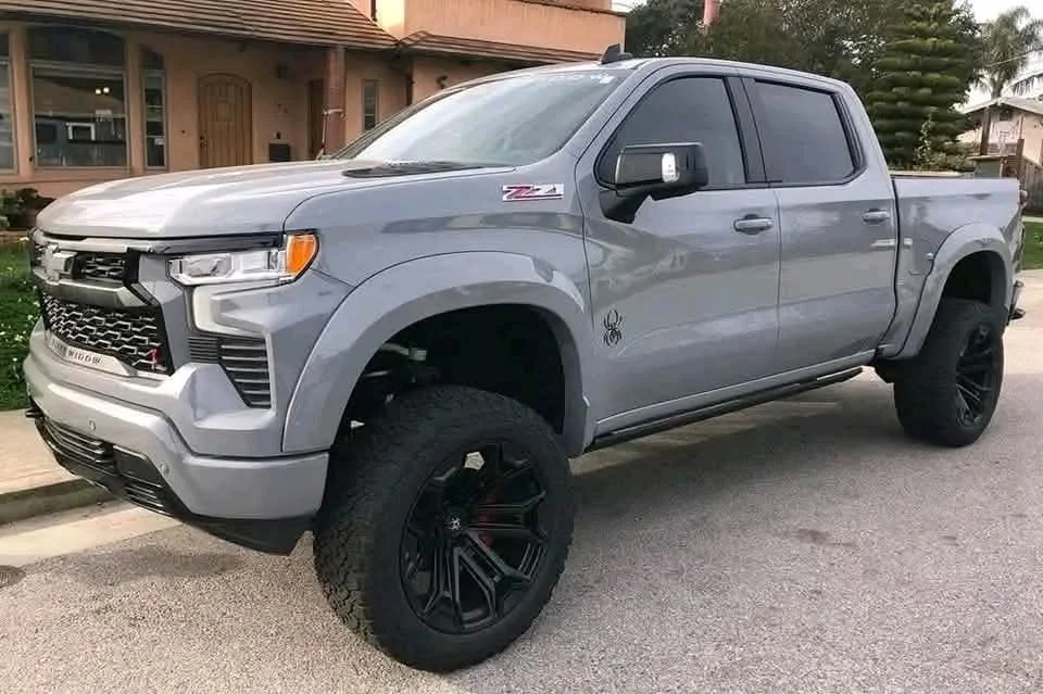 2005 Chevy Silverado Z71 for sale with 6-inch Fabtech lift, XD Series 20-inch wheels, and 35-inch tires at Stricker Cars Yard