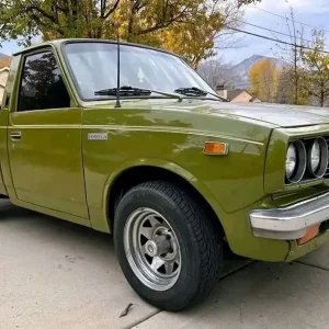 1975 Toyota Pickup SR-5 – Classic Green Compact Truck 1975 Toyota Pickup SR-5 in green with white pinstriping, 65K miles shown, five-speed manual, for sale at Stricker Cars Yard