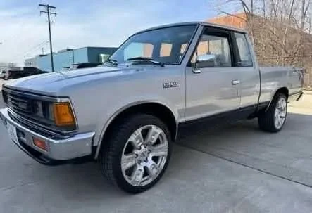 1986 Nissan 720 King Cab ST in silver with gray interior, 67,100 miles, clean title, for sale at Stricker Cars Yard
