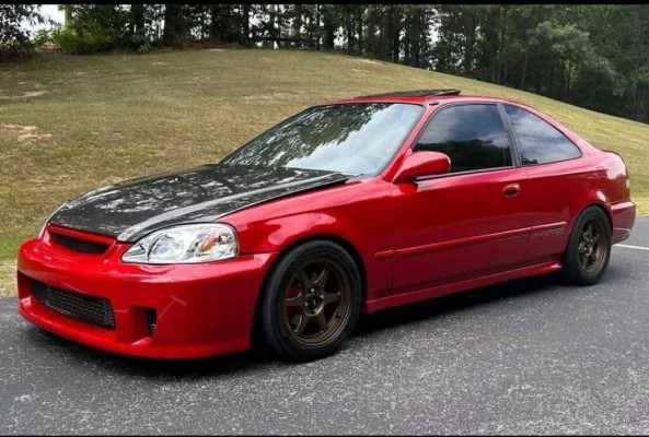 1999 Honda Civic Si coupe in Milano Red exterior for sale at Stricker Cars Yard, 182500 miles, $1000 asking price