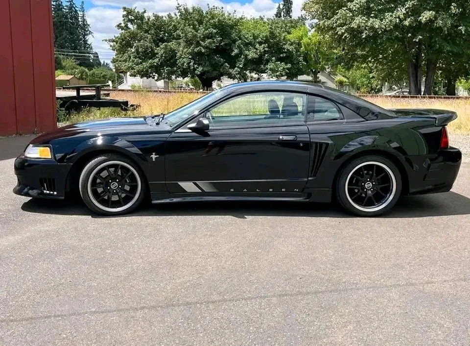 2000 Ford Mustang for sale black coupe with 4.6L V8 and 5-speed manual at Stricker Cars Yard