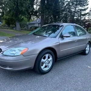 2002 Ford Taurus SES – Beige Used Sedan 2002 Ford Taurus SES beige exterior used sedan for sale at Stricker Cars Yard stock 3477