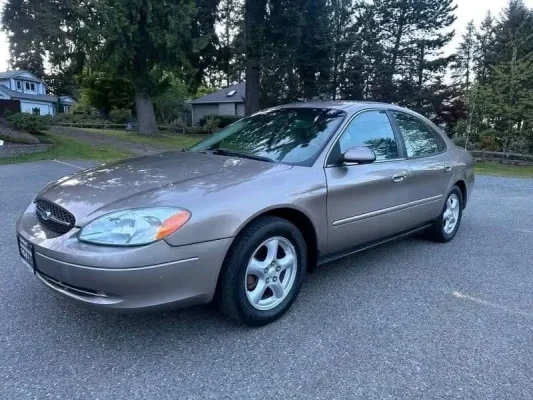 2002 Ford Taurus SES beige exterior used sedan for sale at Stricker Cars Yard stock 3477