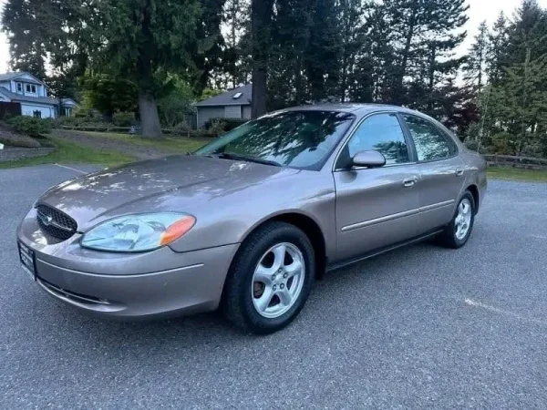 2002 Ford Taurus SES beige exterior used sedan for sale at Stricker Cars Yard stock 3477